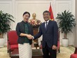 Thứ trưởng Thường trực Bộ Ngoại giao Nguyễn Minh Vũ và bà Lư Tân Ninh.