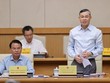 Bộ trưởng Bộ Tài chính Ngô Văn Tuấn báo cáo tại Phiên họp - Ảnh: VGP