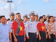 Chuẩn đô đốc Trần Mạnh Chiến (đứng chính giữa hàng đầu) trong chuyến công tác thăm Trường Sa mới đây (Ảnh: Bình Phạm)