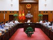 Thủ tướng chủ trì phiên họp Ban Chỉ đạo về tổ chức thi hành án, thu hồi tài sản bị chiếm đoạt, thất thoát trong các vụ án - Ảnh: VGP