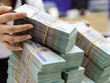 Đầu tư ra nước ngoài: NHNN khống chế trần cho vay ở mức 70% vốn dự án 