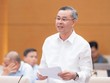 Bộ trưởng Bộ Tài chính Ngô Văn Tuấn trình bày tờ trình dự án luật.