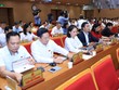 Các đại biểu HĐND TP. Hà Nội bấm nút thông qua Nghị quyết. Ảnh: Thành Thái.