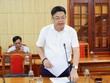 Ông Hồ Xuân Hoè, Giám đốc Sở Công Thương Quảng Trị báo cáo tại cuộc họp. Ảnh: Trường Nhật