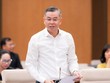 Bộ trưởng Bộ Tài chính Ngô Văn Tuấn trình bày tờ trình. 