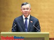 Bộ trưởng Bộ Tài chính Ngô Văn Tuấn trình bày báo cáo giải trình tại Quốc hội - Ảnh Đức Thanh.