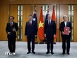 Tổng Bí thư, Chủ tịch nước Tô Lâm và Thủ tướng Australia Anthony Albanese chứng kiến trao văn kiện hợp tác giữa hai nước. (Ảnh: Thống Nhất/TTXVN)