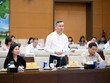 Bộ trưởng Bộ Tài chính Ngô Văn Tuấn trình bày tờ trình - Ảnh: QH.