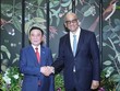 Thường trực Ban Bí thư Trần Cẩm Tú hội kiến Tổng thống Singapore Tharman Shanmugaratnam. Ảnh: TTXVN