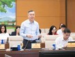  Bộ trưởng Bộ Tài chính Ngô Văn Tuấn báo cáo tại phiên họp - Ảnh: QH. 
