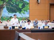 Thứ trưởng Bộ Khoa học và Công nghệ Hoàng Minh trình bày tờ trình - Ảnh: QH. 