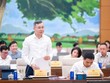 Bộ trưởng Bộ Tài chính Ngô Văn Tuấn trình bày tờ trình dự án luật - Ảnh: QH. 