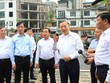 Tổng Bí thư, Chủ tịch nước Tô Lâm và các đồng chí lãnh đạo Trung ương, TP. Hà Nội kiểm tra tiến độ thực hiện Dự án đường Vành đai 1 và Dự án bãi đỗ xe, cây xanh trên địa bàn phường Ô Chợ Dừa. Ảnh Quang Thái