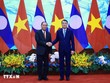Thủ tướng Lê Minh Hưng tiếp đồng chí Vilay Lakhamfong, Thường trực Ban Bí thư Trung ương Đảng Nhân dân Cách mạng Lào. (Ảnh: Dương Giang/TTXVN)