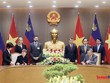 Bộ trưởng Bộ Tài chính Ngô Văn Tuấn và Thủ tướng Liechtenstein Brigitte Haas ký Hiệp định tránh đánh thuế hai lần dưới sự chứng kiến của Thủ tướng Lê Minh Hưng.