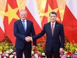 Thủ tướng Lê Minh Hưng và Thủ tướng Donald Tusk chụp ảnh chung. Ảnh: Đức Thanh.