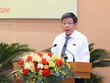 Phó Chủ tịch Thường trực UBND TP. Hà Nội Dương Đức Tuấn trình bày tờ trình.