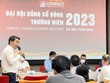Chủ tịch Nguyễn Văn Công ngồi giữa bàn chủ tọa ĐHCĐ 2023 của Coninco