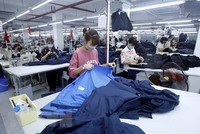 Sản xuất hàng dệt may. (Nguồn: TTXVN).