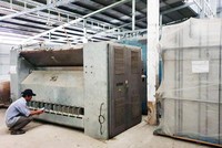 Dây chuyền máy móc hàng chục tỷ đồng của Công ty TNHH Dịch vụ An Hạ bị phủ bụi vì chờ giải quyết thủ tục đất đai.