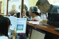Thủ tục cấp sổ đỏ đã có cải thiện, nhưng vẫn còn nhiều tồn tại. Ảnh: Dũng Minh