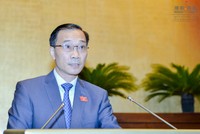 Chủ nhiệm Ủy ban kinh tế của Quốc hội Vũ Hồng Thanh trình bày Báo cáo thẩm tra dự án Luật quản lý ngoại thương sáng 27/10.