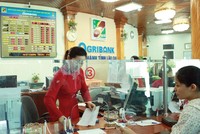Giao dịch tại Agribank Chi nhánh Lào Cai. Ảnh: Đức Thanh