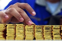 Tỷ giá trung tâm ngày 14/3 giảm mạnh 15 đồng/USD, vàng JSC tăng vượt giá thế giới