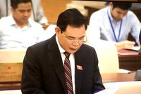 Bộ trưởng Bộ Nông nghiệp và Phát triển nông thôn Nguyễn Xuân Cường trình bày Tờ trình của Chính phủ về dự án Luật - Ảnh: VGP/Nguyễn Hoàng.