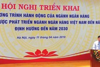 Ông Phạm Thanh Hà, Vụ trưởng Vụ Chính sách tiền tệ phát biểu tại Hội nghị.