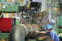 Sản xuất tại nhà máy của Công ty Doosan Vina (Chu Lai). Ảnh: Đức Thanh.