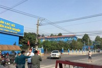 Phong tỏa Trường Đại học Thủ Dầu Một, nơi sinh viên N.T.M.A theo học. (Ảnh: Văn Hướng/TTXVN).