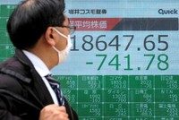 Chỉ số Nikkei 225 của Nhật Bản để tuột điểm ngay từ đầu phiên và gần như đi ngang. Ảnh tư liệu: AFP.