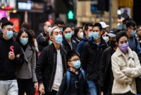 Đeo khẩu trang ở Trung Quốc thời Covid-19. Ảnh: DNA India.