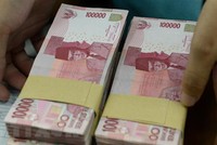 Đồng rupiah của Indonesia. (Ảnh: AFP/TTXVN)