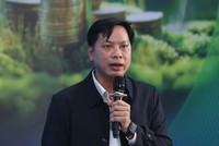 Ông Vương Văn Quý, Phó trưởng ban Chính sách tín dụng, Agribank trình bày tại hội thảo. Ảnh: Dũng Minh