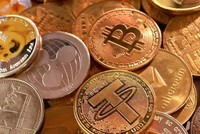 Thị trường tiền điện tử phản ánh trái chiều sau khi Fed hạ lãi suất