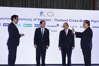 Chủ tịch nước Nguyễn Xuân Phúc và Bộ trưởng Bộ Tài chính Thái Lan chứng kiến Lễ công bố kết nối thanh toán bán lẻ ứng dụng mã phản hồi nhanh (QR code) giữa Việt Nam – Thái Lan