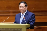Thủ tướng Chính phủ Phạm Minh Chính trình bày báo cáo kinh tế xã hội sáng 5/5 (Ảnh: Giang Huy)