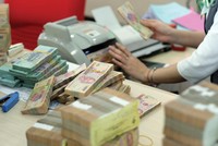 Bỏ cơ chế “room” tín dụng cho nhiều nhóm ngân hàng