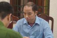 Đối tượng Nguyễn Xuân Chinh làm việc với cơ quan công an.