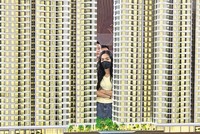 Việc giá chung cư tăng “phi mã” đã tác động tiêu cực tới khả năng thanh khoản. Ảnh: Thanh Vũ