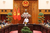 Phó Thủ tướng Hồ Quốc Dũng chủ trì cuộc họp đánh giá tình hình triển khai Nghị quyết 66-NQ/TW và Nghị quyết 140/NQ-CP - Ảnh: VGP.