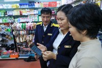 Điểm nhấn lớn của năm là Chiến dịch “60 ngày cao điểm chuyển đổi mô hình từ thuế khoán sang kê khai đối với hộ kinh doanh”. Ảnh: Đức Thanh.