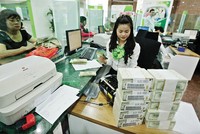 Năm 2014, Vietcombank đặt mục tiêu huy động vốn từ nền kinh tế 384.493  tỷ đồng