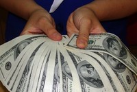Kiều hối năm nay ước đạt 5,5 tỷ USD. Ảnh: Lệ Chi.