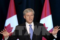 Thủ tướng Canada Stephen Harper trong cuộc họp báo về Hiệp định TPP tại Ottawa, ngày 5/10.(Nguồn: Reuters/TTXVN)