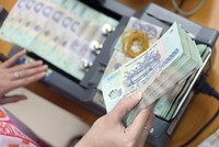 Lãi suất VND có thể giảm nhẹ trong thời gian tới, khi tỷ giá USD/VND đang ổn định 
