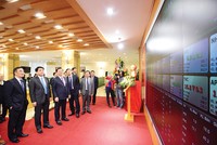 Bộ trưởng Bộ Tài chính cùng các quan chức trong ngành chứng kiến phiên khai trương giao dịch tại HNX đầu năm 2016