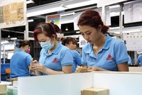 Sản xuất bao bì tại Công ty Goldsun cung cấp cho Samsung - doanh nghiệp FDI có đóng góp lớn nhất vào xuất khẩu của Việt Nam. Ảnh: Đức Thanh